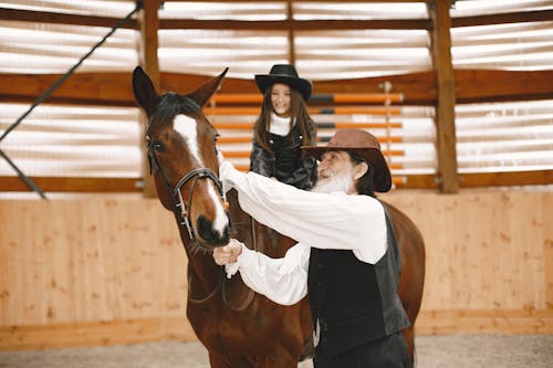 Man with Girl on Horse