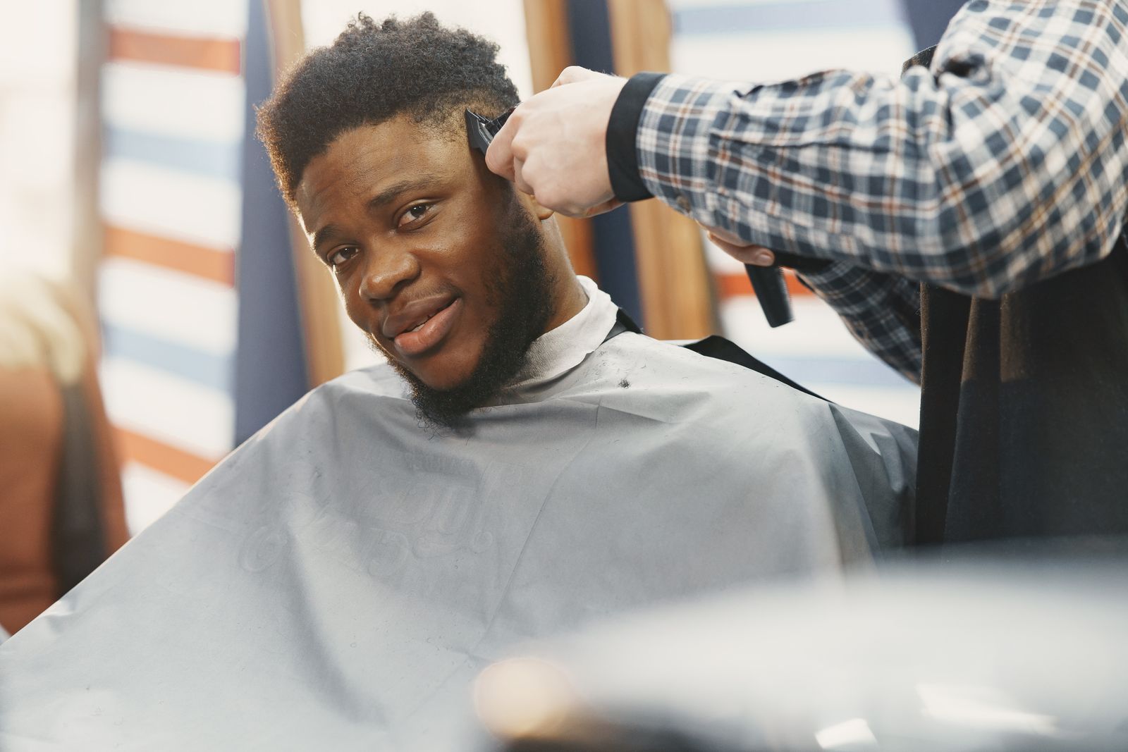 A professional barber service setup gives workplace grooming perks a polished, practical feel.