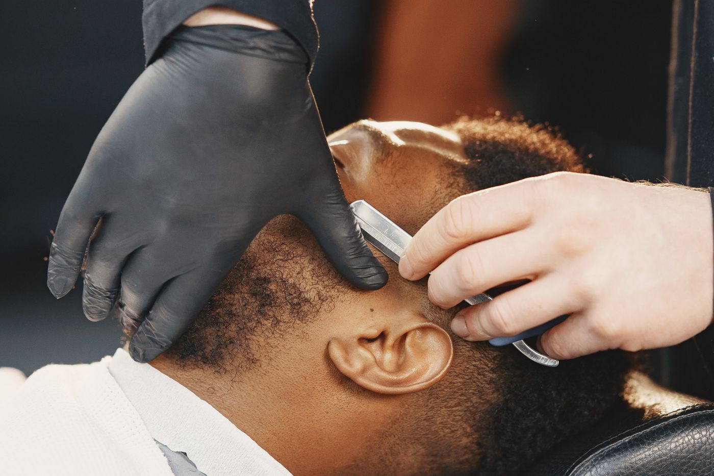 A straight razor shave in progress