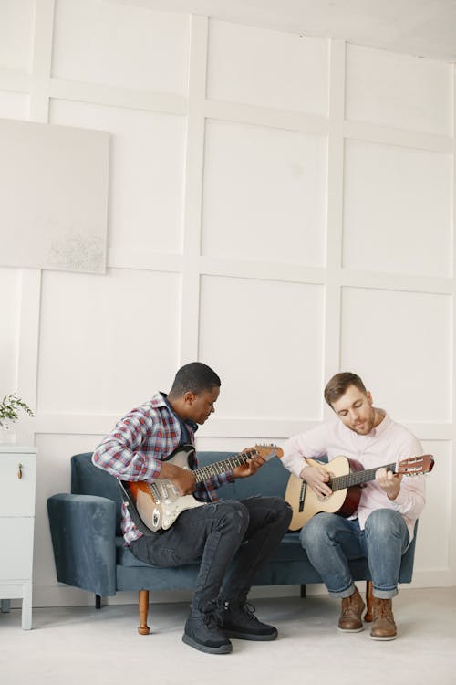 Foto profissional grátis de fechar-se, homens, instrumentos musicais