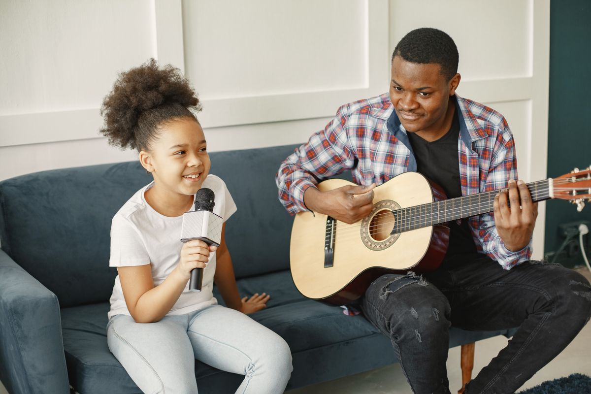 Student practicing guitar