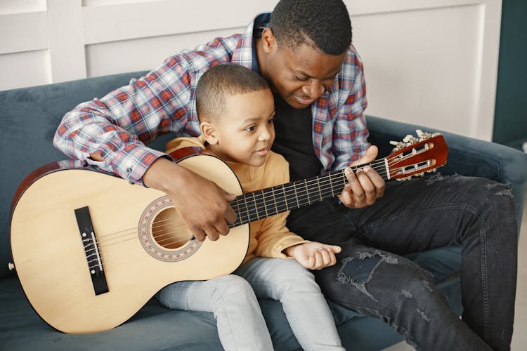 Father And Son With Guitar