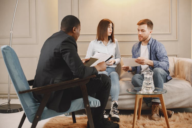 Photograph Of A Couple Having A Counseling Session