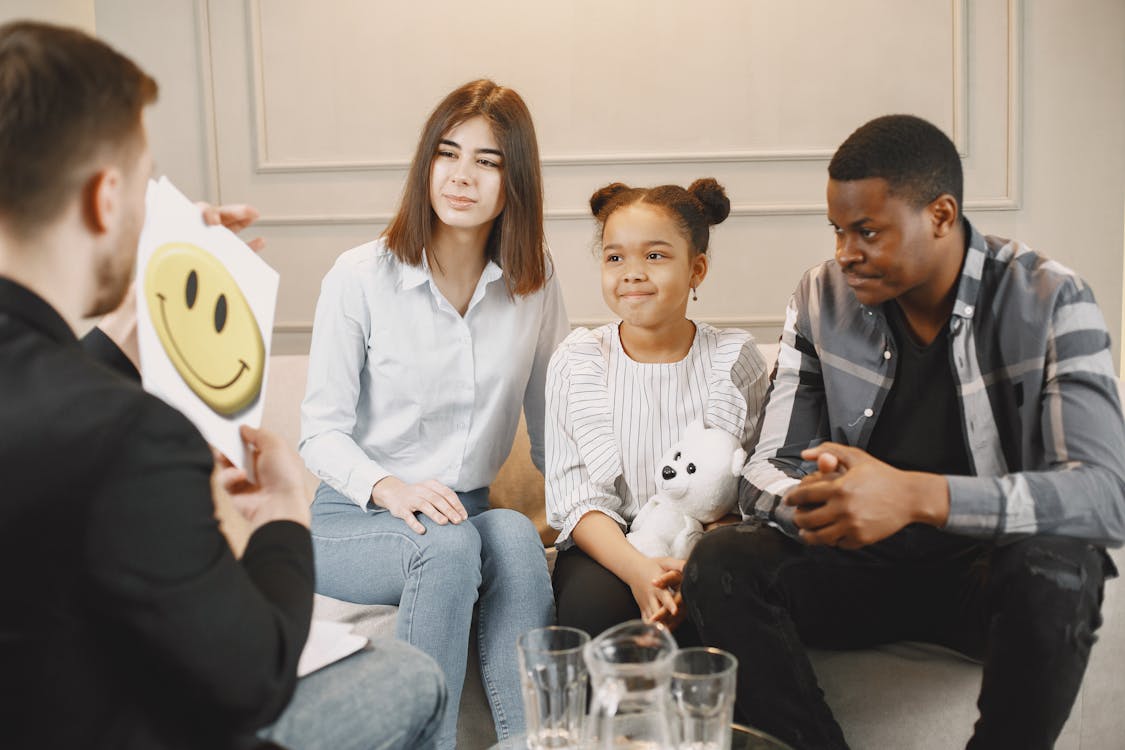 Free Photo of a Family Doing a Therapy Session Stock Photo