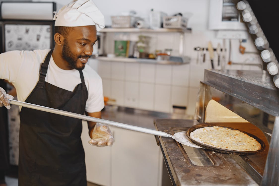 Placing Pizza in Oven 