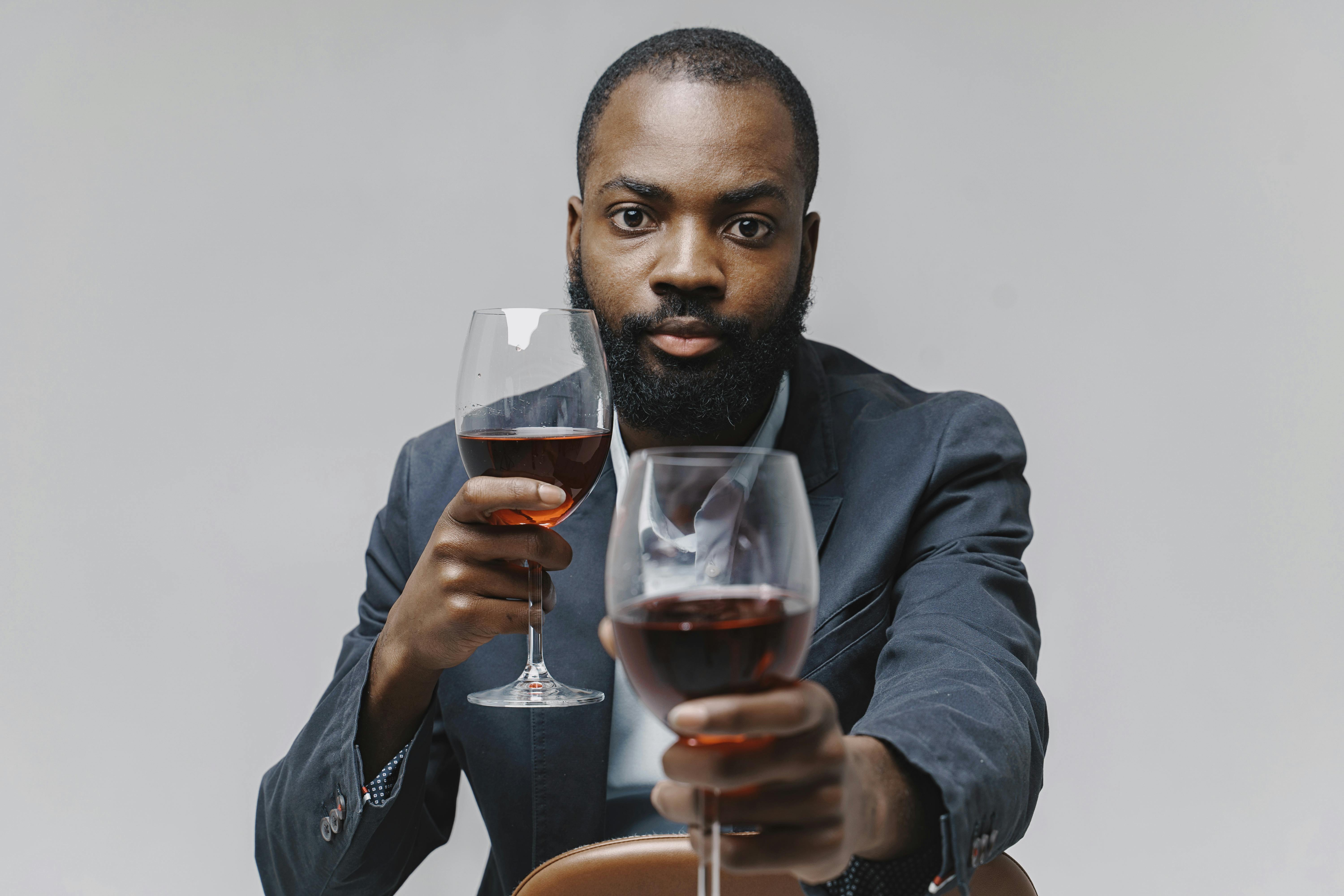 Man with wine glass Stock Photo by ©Tverdohlib.com 94262798