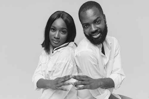 Free Elegant monochrome portrait of a couple in studio setting. Stock Photo