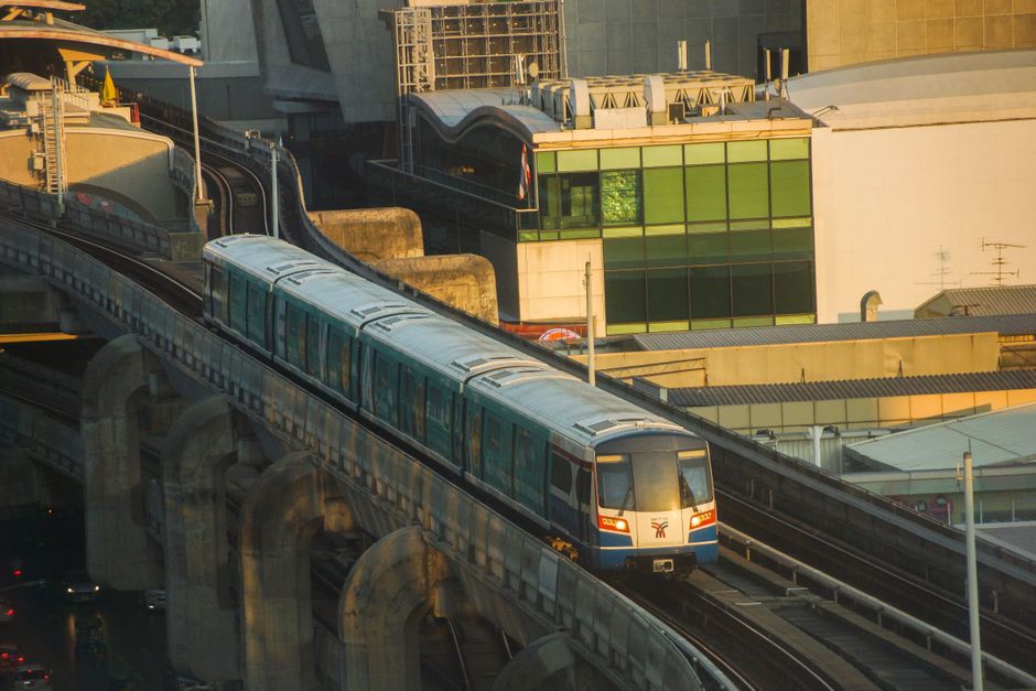 Modern Airport Rail Link train arriving at a station in Bangkok, Thailand