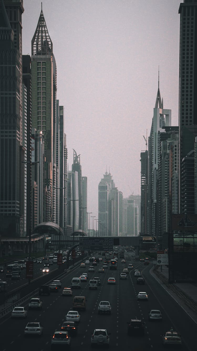 Busy Traffic On The Highways In Between Buildings