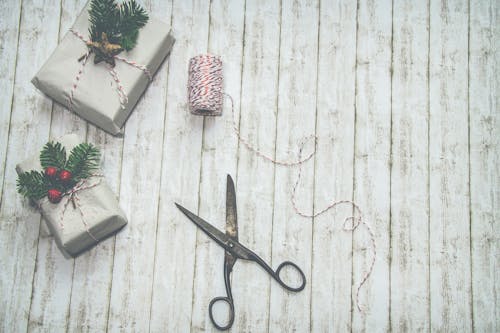 Two Gray-and-green Christmas-themed Gift Boxes