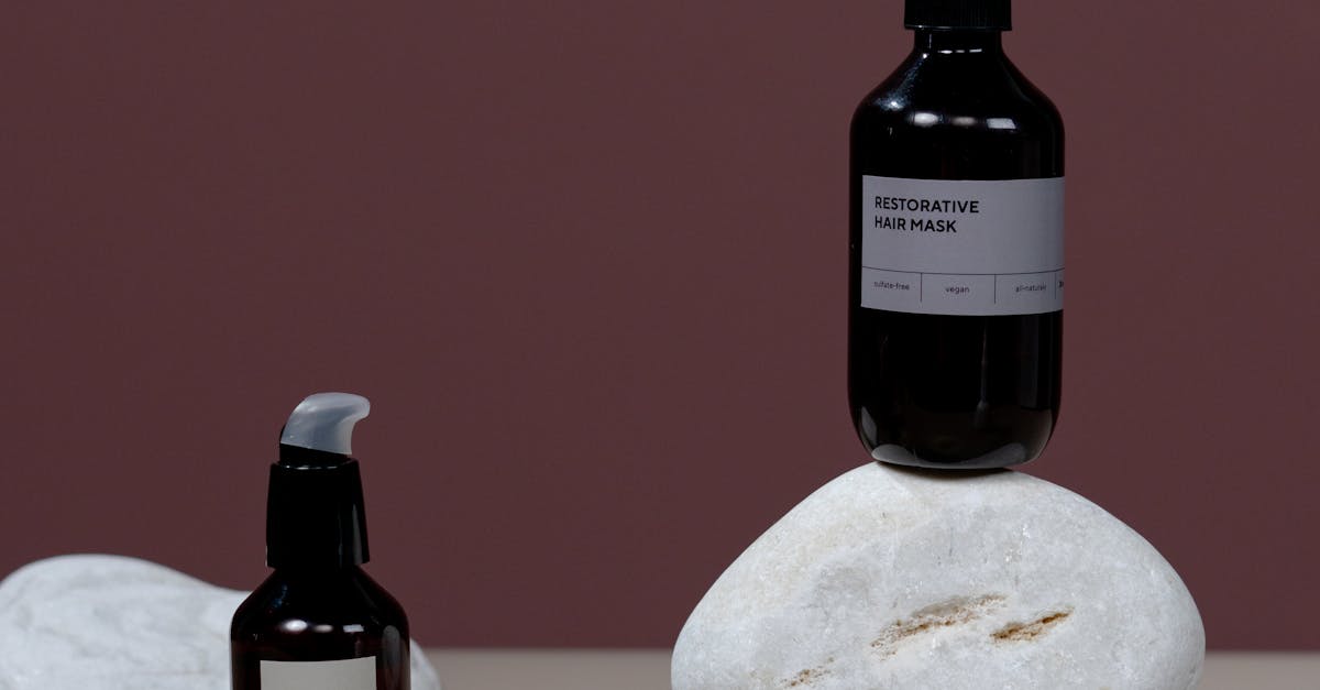 Labeled Bottles on Top of a Stones