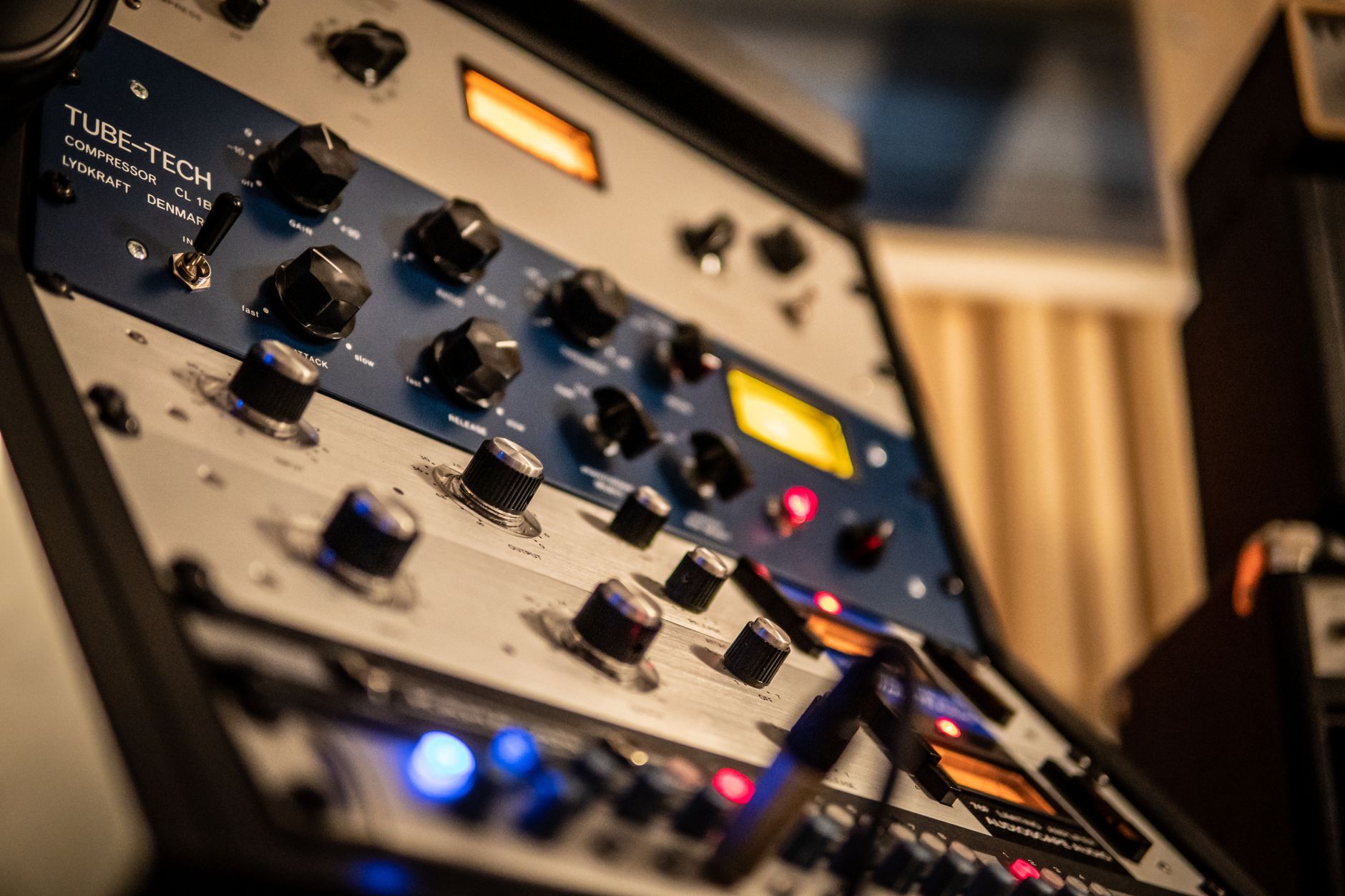 Stock Effects Detail Close-up of EQ and compression controls for stock mixing tools