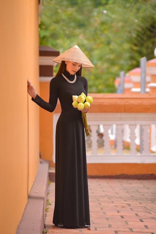 Free Woman in Black Dress Wearing Straw Hat Stock Photo