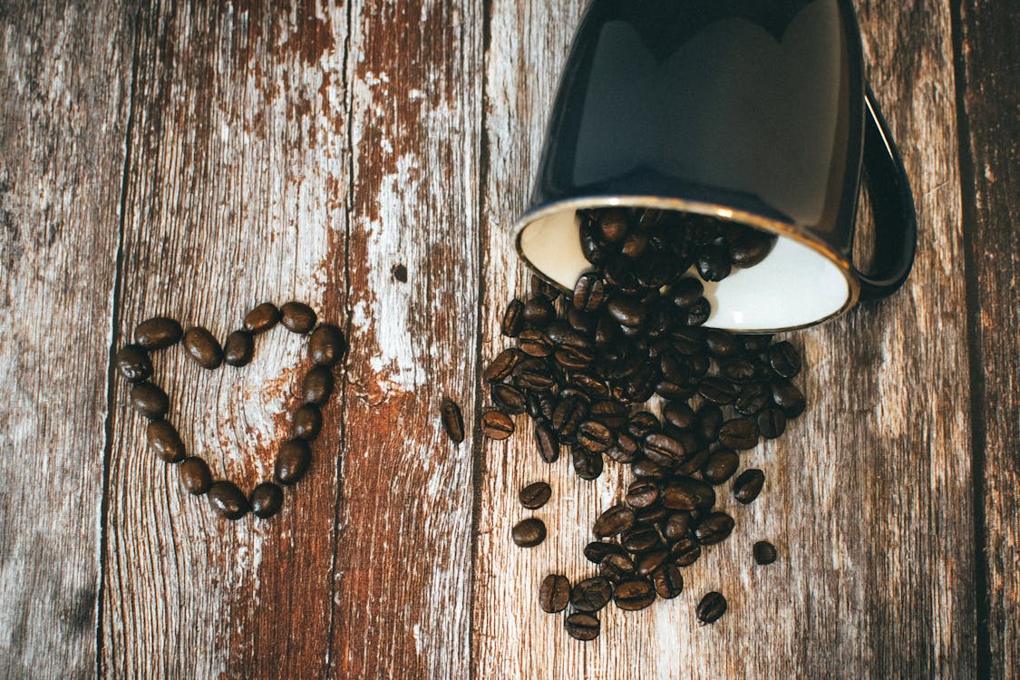 Black Ceramic Coffee Mug and Beans