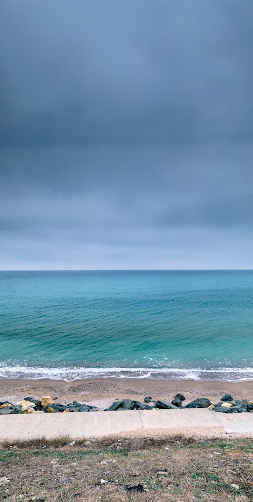 Foto profissional grátis de beira-mar, horizonte, litoral
