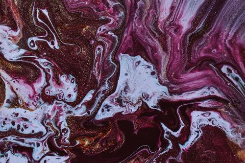 Free A stunning abstract art piece showcasing vibrant acrylic paint swirls enhanced with glitter effects. Stock Photo
