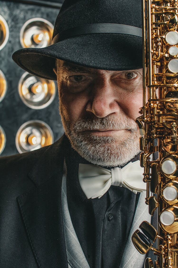 Old Man In Suit With Saxophone