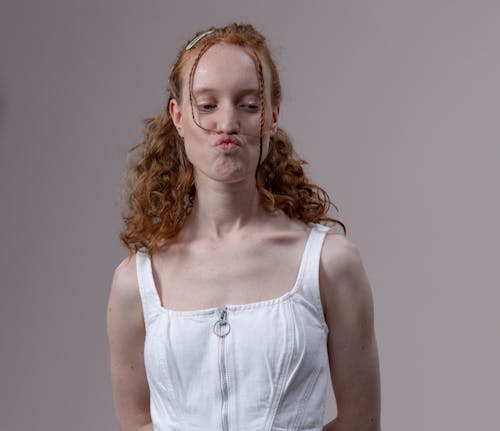 Woman in White Tank Top