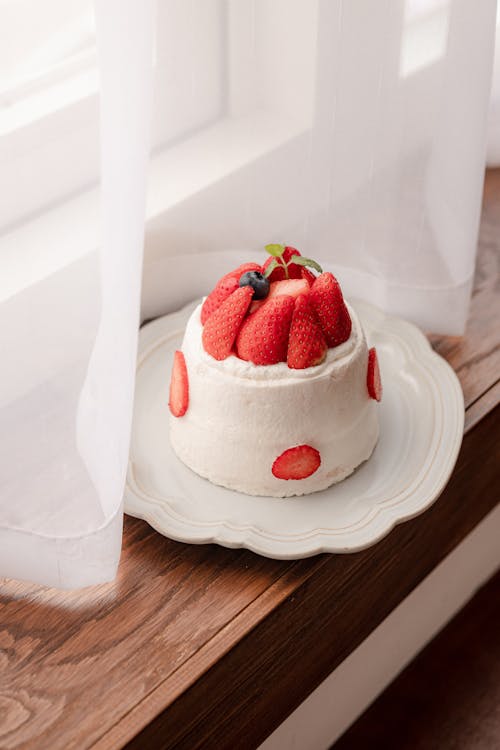 Free White and Red Strawberry Cake on White Ceramic Plate Stock Photo