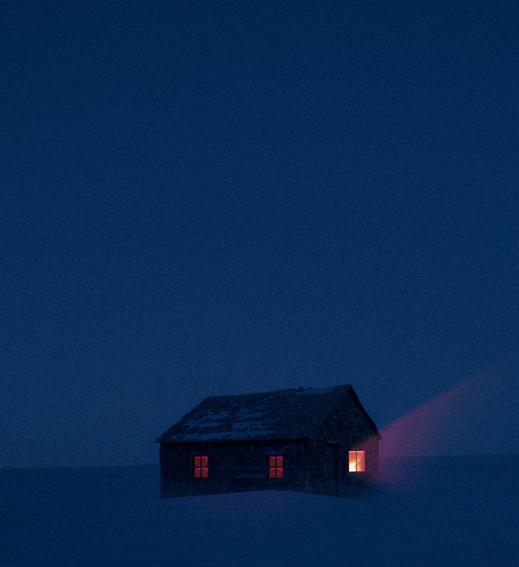 House On Snow Covered Ground