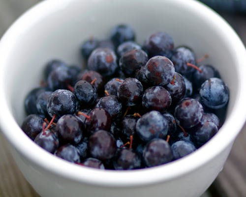 Blueberries in White Ceramic Bowl