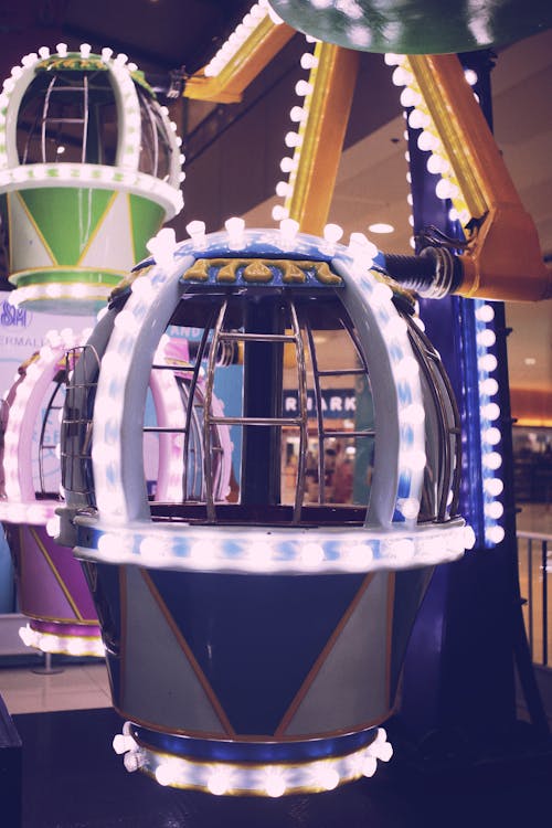 Illuminated carousel in amusement park