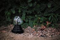 Plasma ball placed in nature in daylight