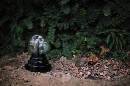 Plasma ball placed in nature in daylight