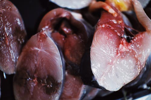 Raw fish placed in heap in daylight