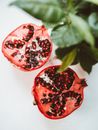 Red Round Fruit on White Surface