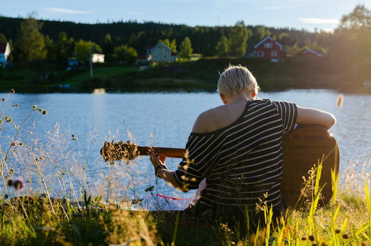 Woman Playing Guitar