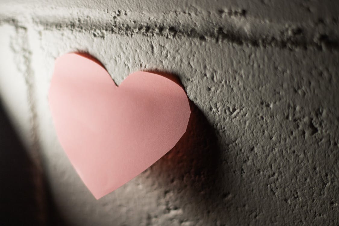 Heart Shaped Paper on a Wall