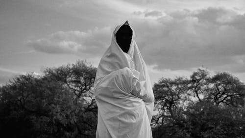 Free Grayscale Photo of Person Covering With Blanket Stock Photo