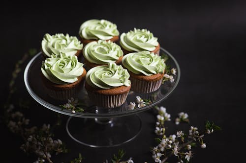 Green and Brown Cupcakes on Black Round Tray