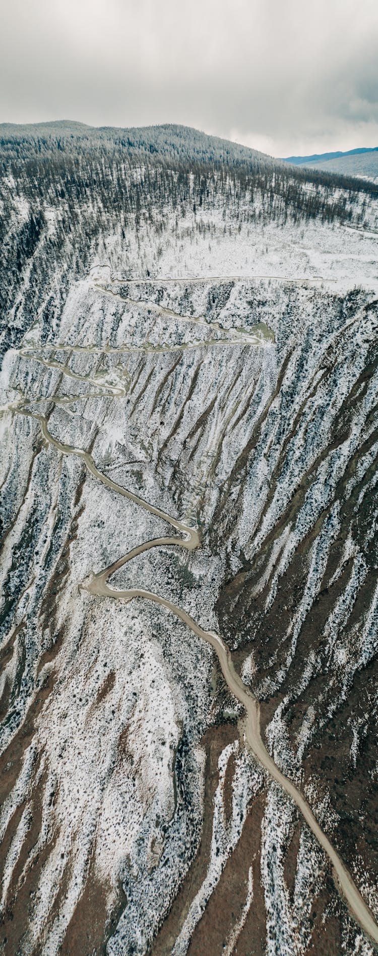 A Road On Mountain Top Under White Clouds