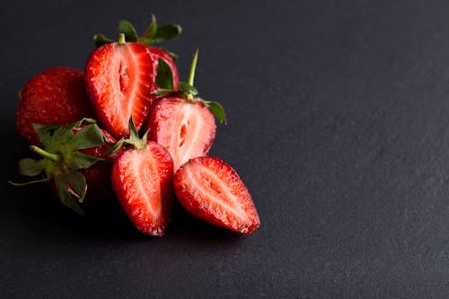 Close-Up Photograph of Sliced Strawberries