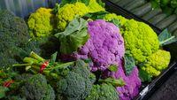 Fresh broccoli and cauliflower at a market — photo by Kindel Media on Pexels