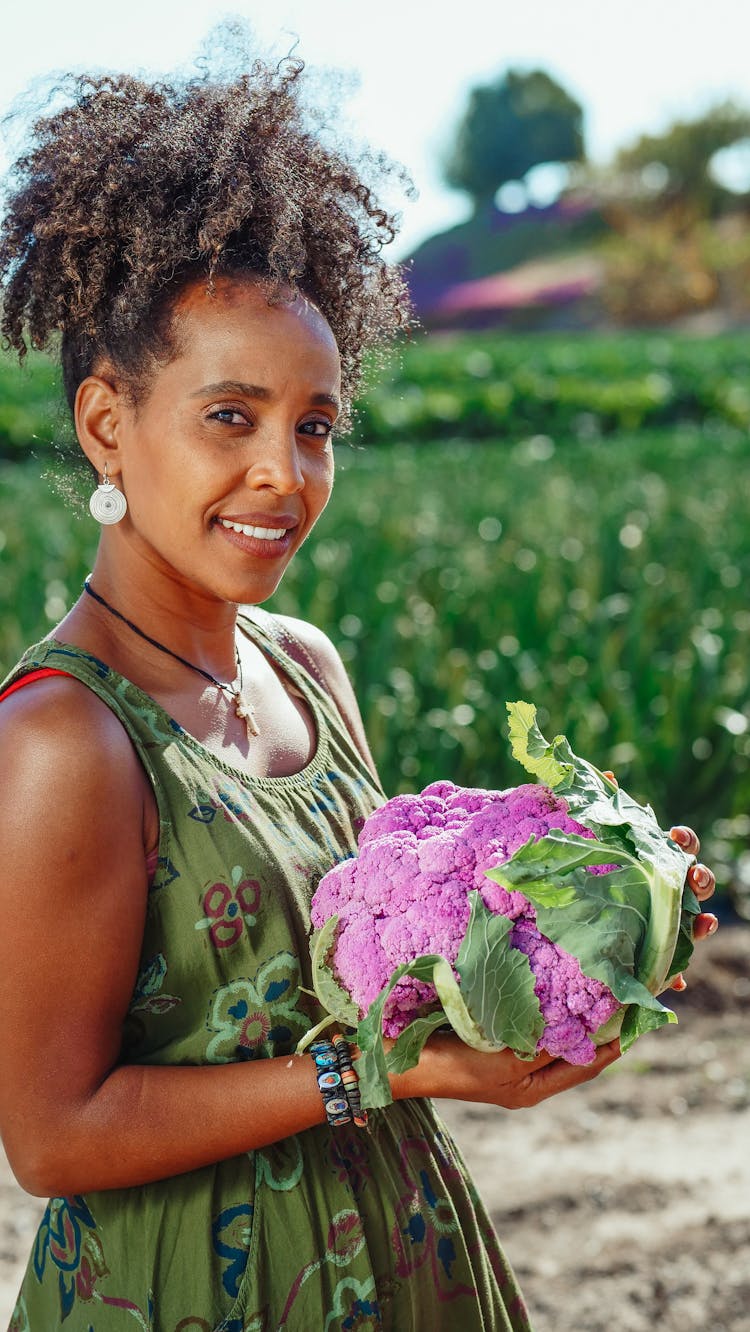 Woman Holding Cauliflower