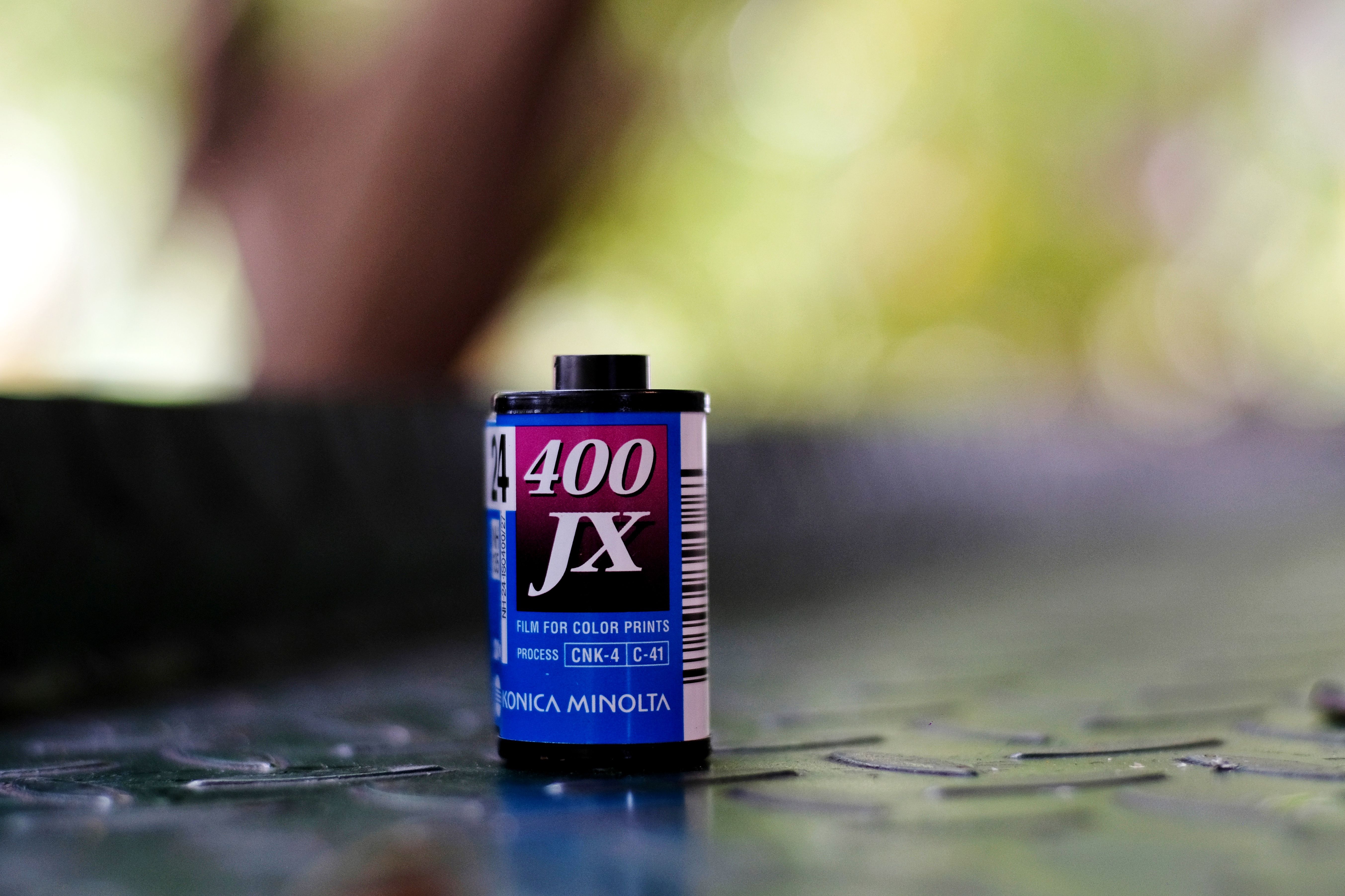 Close-up of 400 JX film roll, perfect for vintage photography themes