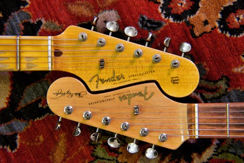 Free Headstock of Brown Guitars Stock Photo
