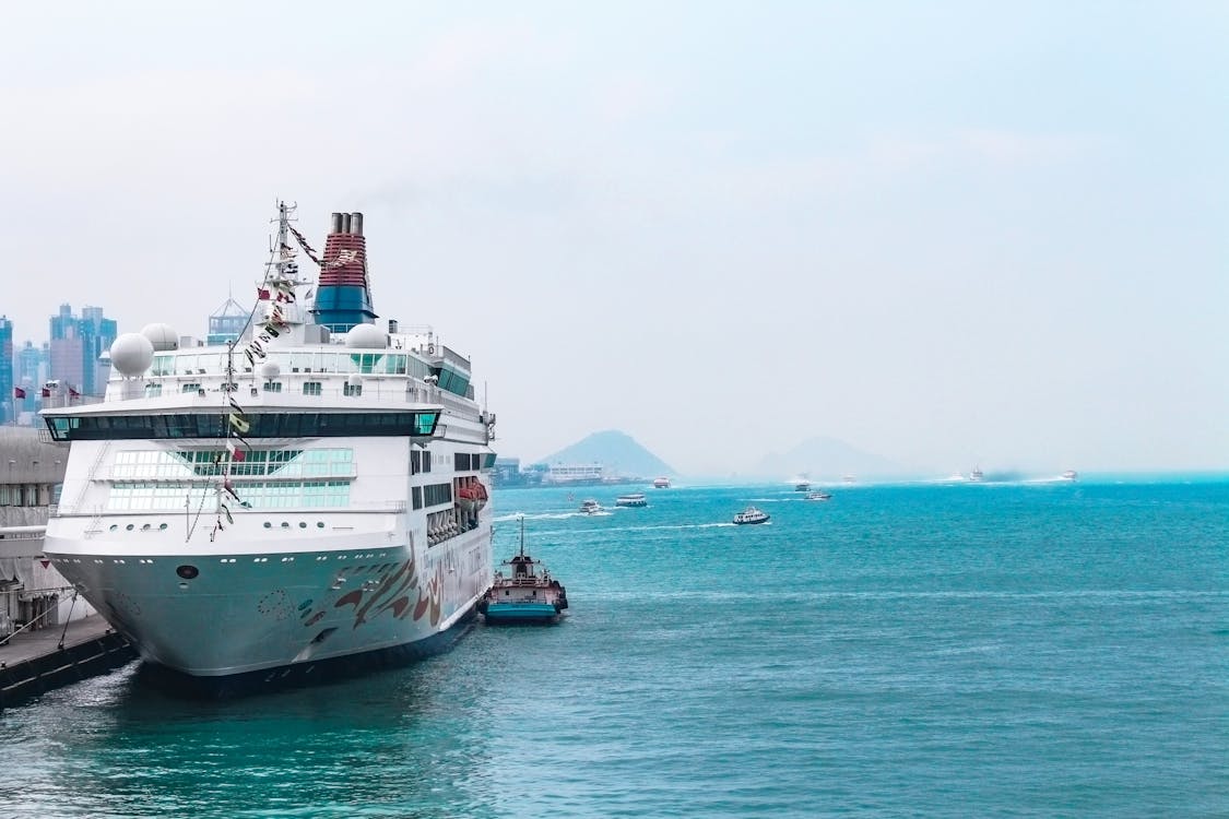Free White Cruise Ship Docking in Port Stock Photo