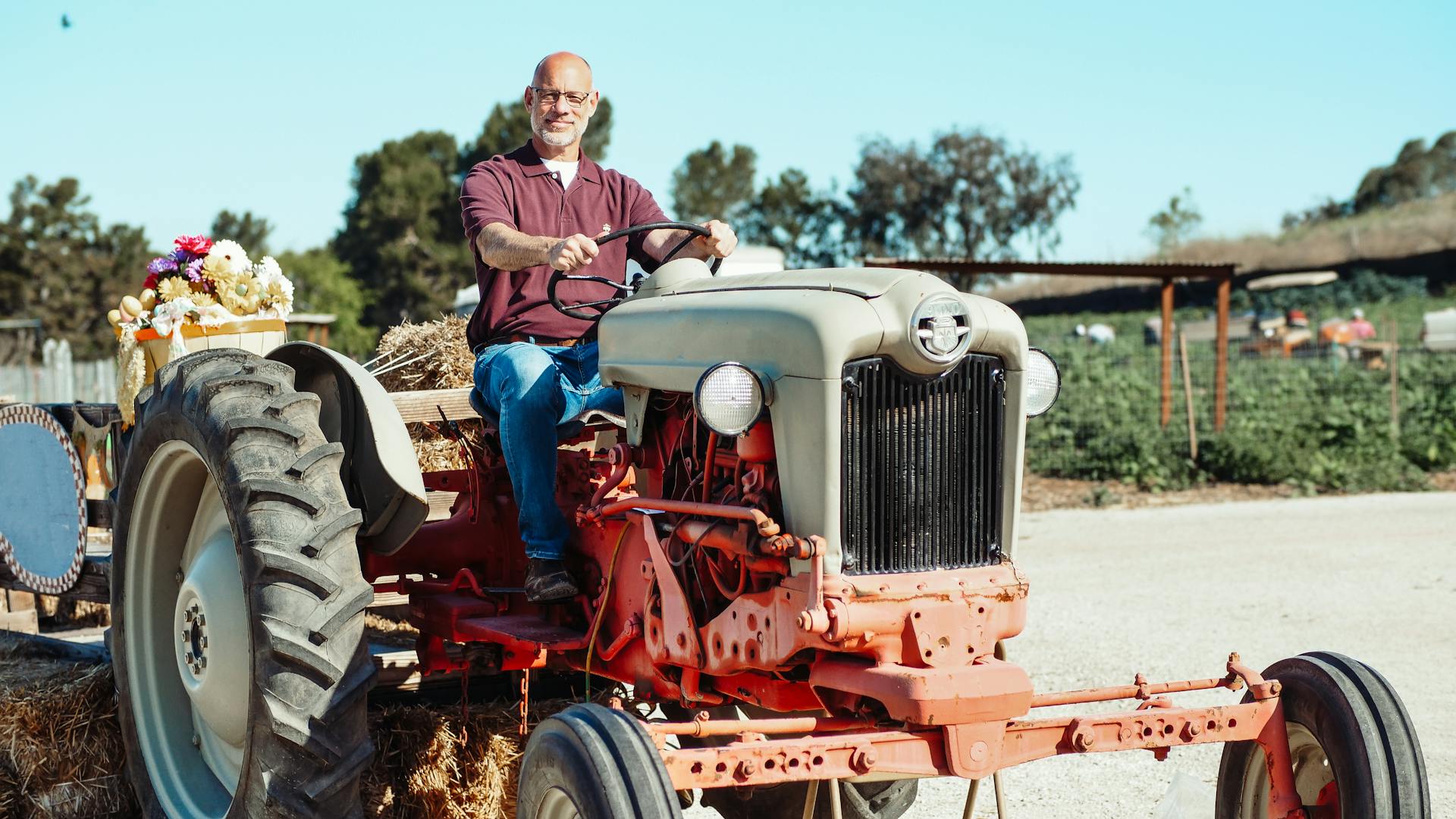 Man in the Farm Driving a Tractor Truck