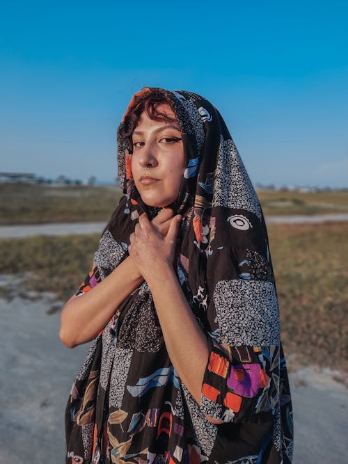 A Woman in Black Scarf