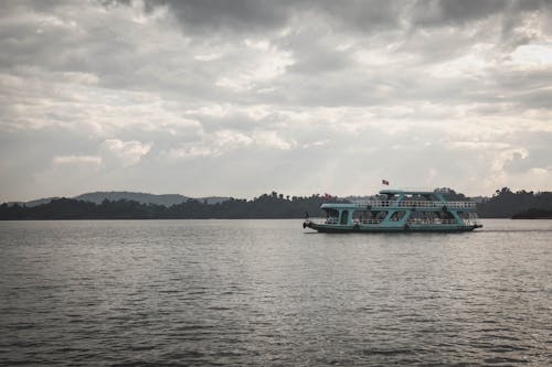 Free stock photo of boat, cloudy sky, laos