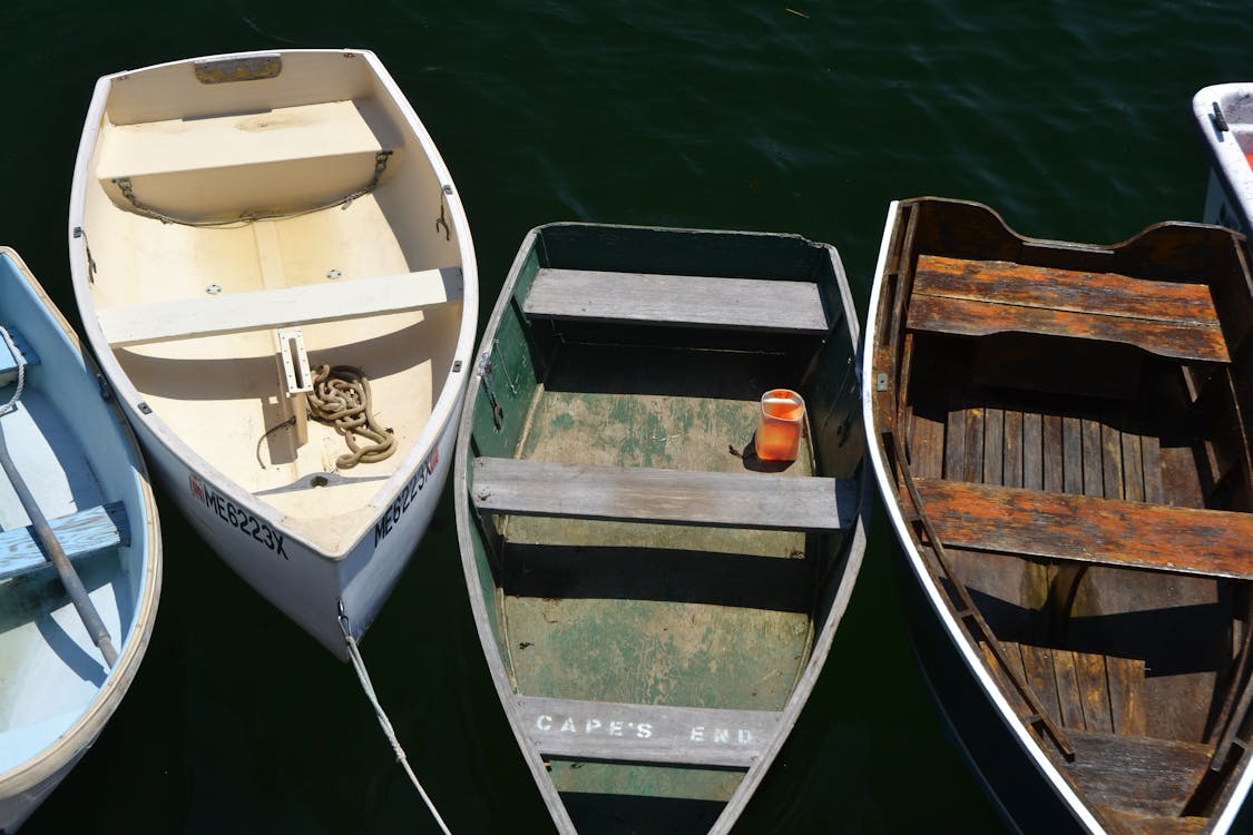 Free Four Brown Boats Stock Photo