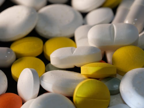 Free White and Yellow Medication Pills Stock Photo