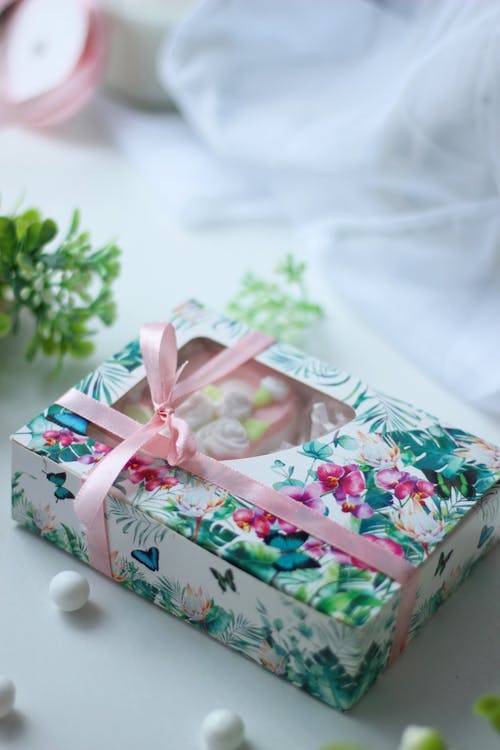 A Gift Box with a Pink Ribbon