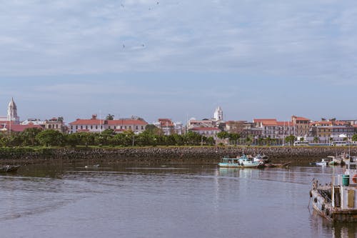 Fishing Boats at the Pier under the Sky
