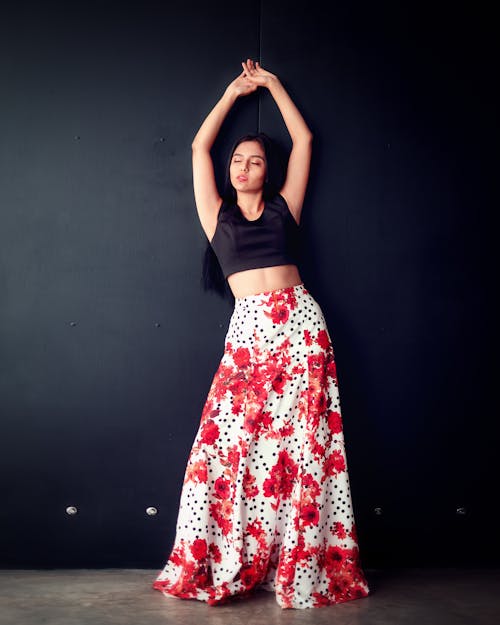 Free Woman in Black Crop Top and Floral Skirt Posing Stock Photo