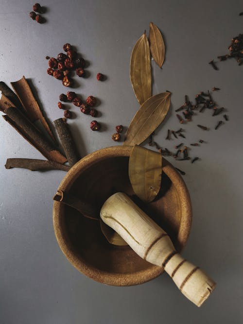 Free Brown Wooden Mortar and Pestle Stock Photo